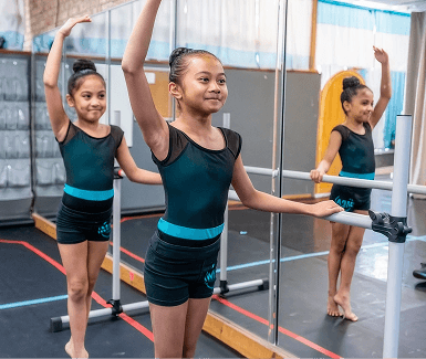 Momentum dancers in costume at a competition